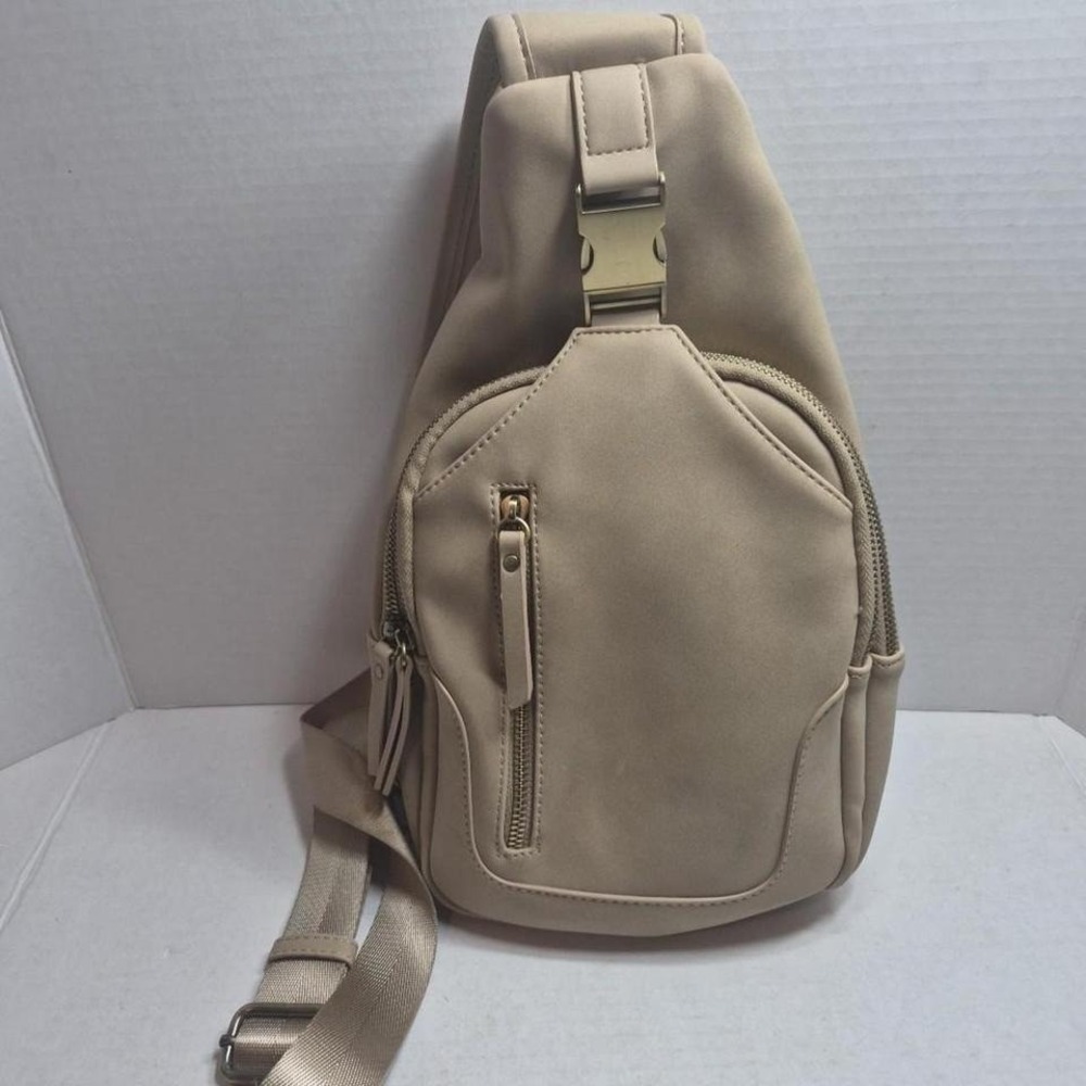 Tan backpack crossbody with adjustable‎ straps outdoors hiking bag